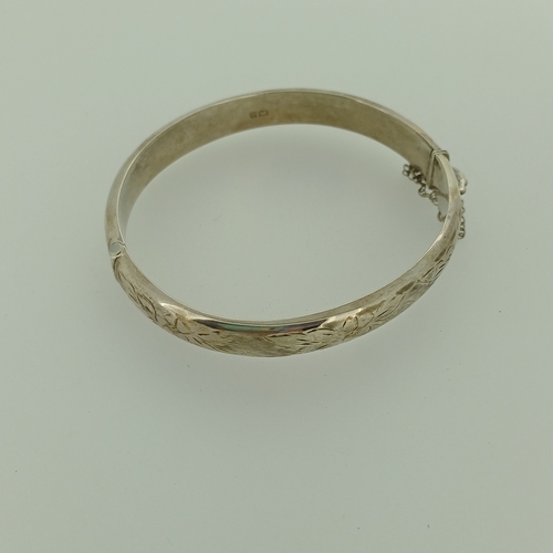 14 - Here with have another beautiful Silver Hinged Bangle.  Funny, it is a bit like Buses nothing coming... 