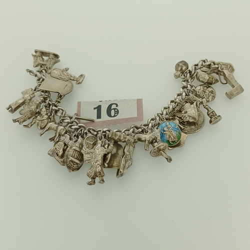 16 - Here we have the second of our Silver Charm Bracelets.  This is a very heavy bracelet crammed with c... 