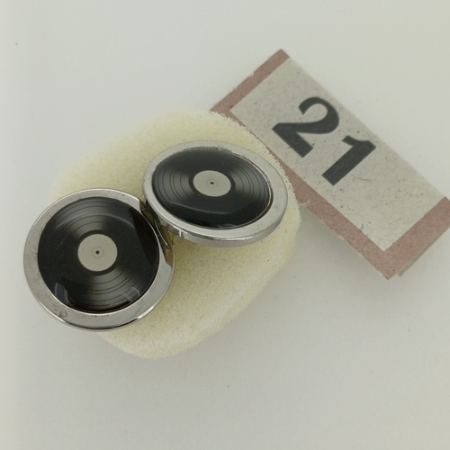 21 - Cuff Links. Silver Colour Metal.  Black insert which looks very much like a vinyl record.
- circa 19... 