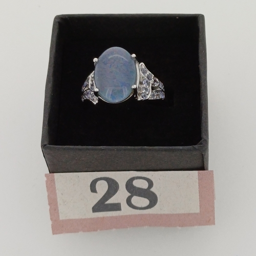 28 - This is a very pretty Ladies Doublet Opal and Tanzanite Ring
- circa 1980's
- Size P
- Silver colour... 