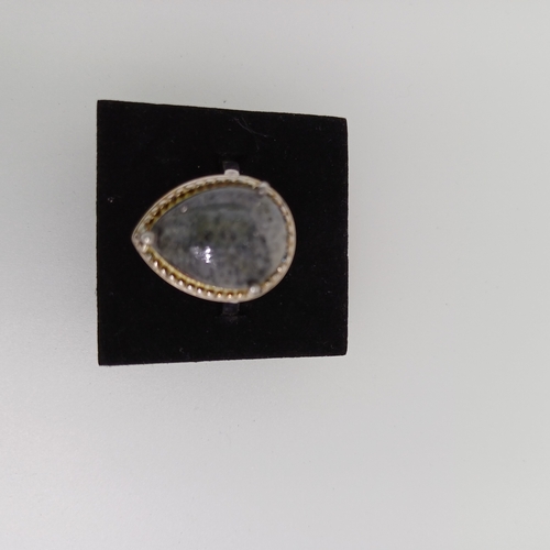 57 - Ladies Silver Ring with an unusual stone, but possibly Labradorite in Size O