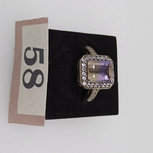 58 - Ladies Silver Ring with Purple and White Stones
Size O