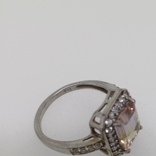 58 - Ladies Silver Ring with Purple and White Stones
Size O