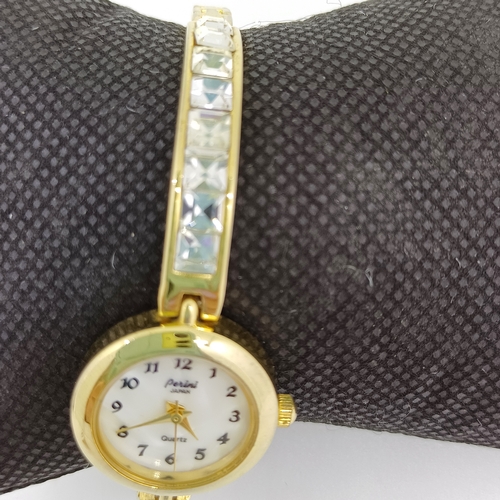 63 - Ladies Perini Watch. Gold Colour Metal with White Stones set in the Bracelet