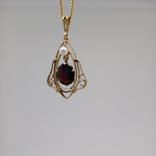 70 - This is a Very Beautiful Garnet and Pearl Pendant.
- Circa 1950's
- 9ct Gold