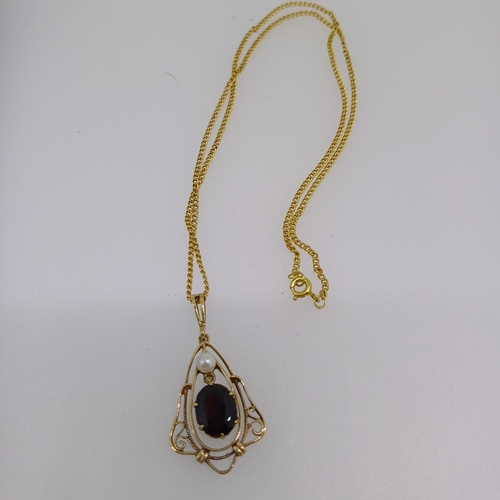 70 - This is a Very Beautiful Garnet and Pearl Pendant.
- Circa 1950's
- 9ct Gold