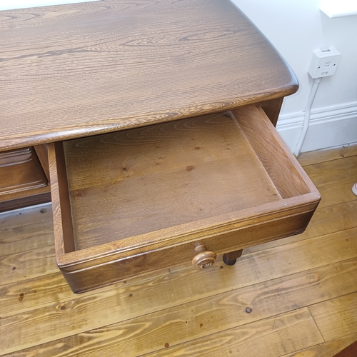 78 - Ercol Blonde Side Table with Two Drawers
Size: W - 102cm D - 48 H - 75