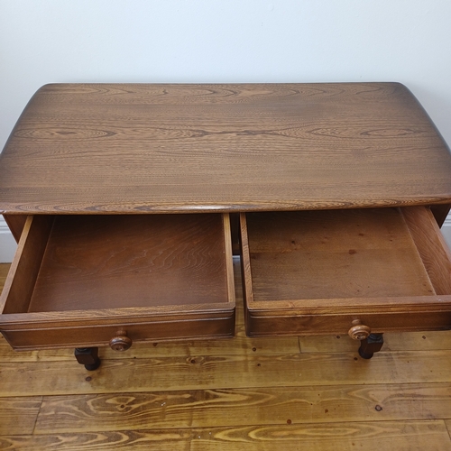 78 - Ercol Blonde Side Table with Two Drawers
Size: W - 102cm D - 48 H - 75