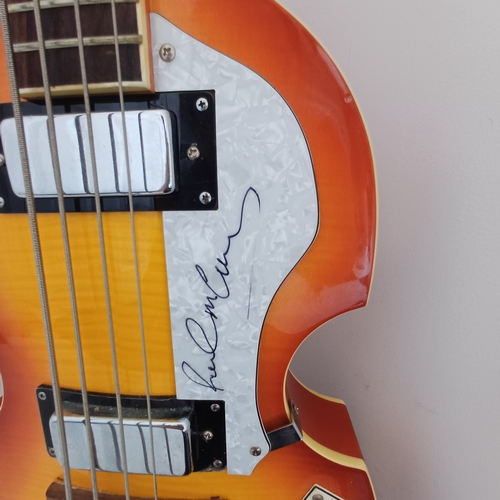 84 - Now we have the first of our Autographed items.  Lot 84 is a Guitar signed by none other than Sir Pa... 