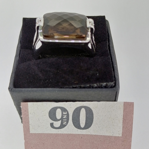 90 - A quality Topaz Ring with Diamond Sides
- 18ct white gold
- weight 13 g
Size - T