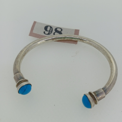 98 - Silver Tort Bangle 960's with Turquoise Stones
- weight 21 g