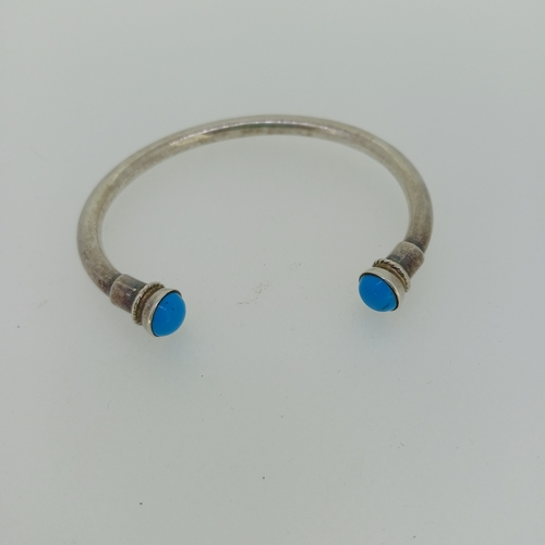 98 - Silver Tort Bangle 960's with Turquoise Stones
- weight 21 g