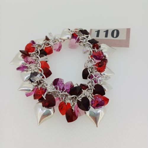 110 - A 1970's Silver Red Stones with Silver Hearts Bracelet
- weight 60 grams