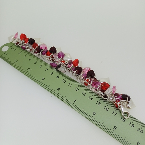 110 - A 1970's Silver Red Stones with Silver Hearts Bracelet
- weight 60 grams