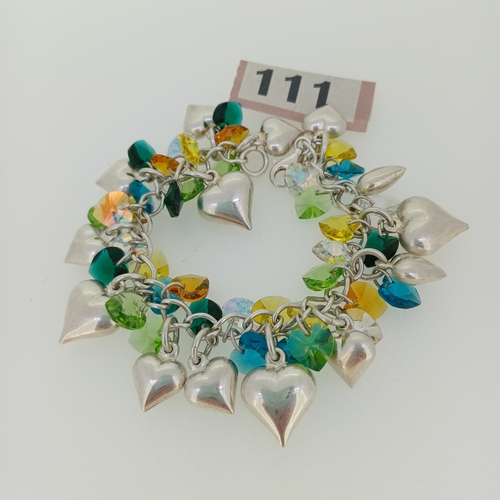 111 - This is a very pretty 1970's Bracelet in Silver with Green, Blue and Yellow Stones with Silver Heart... 