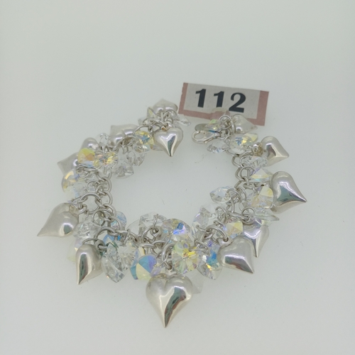 112 - Here with have another pretty 1970's Bracelet with Clear Stones that are light retracting with Silve... 