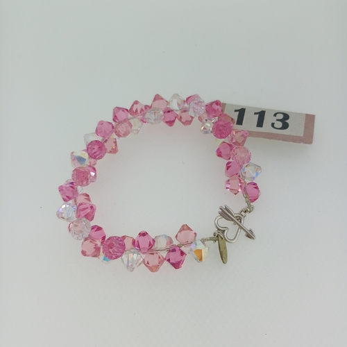 113 - Krishna Silver Bracelet.  With Clear, Dark Pink and Light Pink Stones.  Lovely clasp detail with an ... 