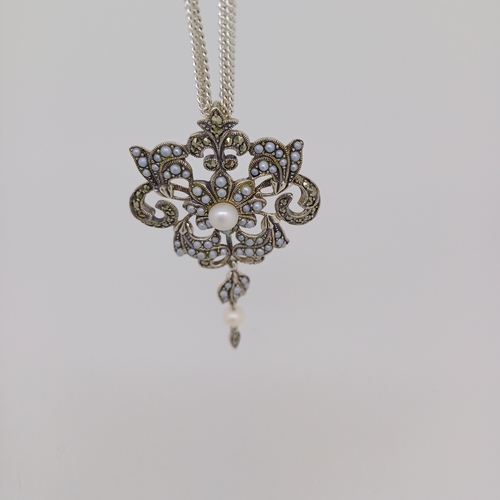 120 - A very lovely Silver Pendant and Chain with Sea Pearls