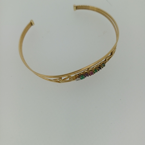 130 - A Very Pretty 9 ct Gold Bangle with multi colour stones  It weighs 5 g