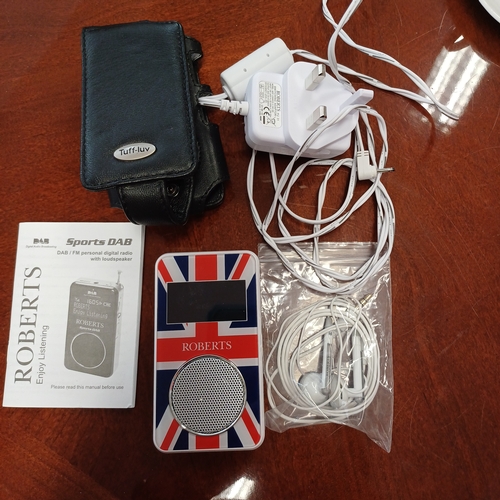 168 - A Roberts Personal Radio with Ear Phones and Charging Unit.  This is in a Union Flag design as it wa... 