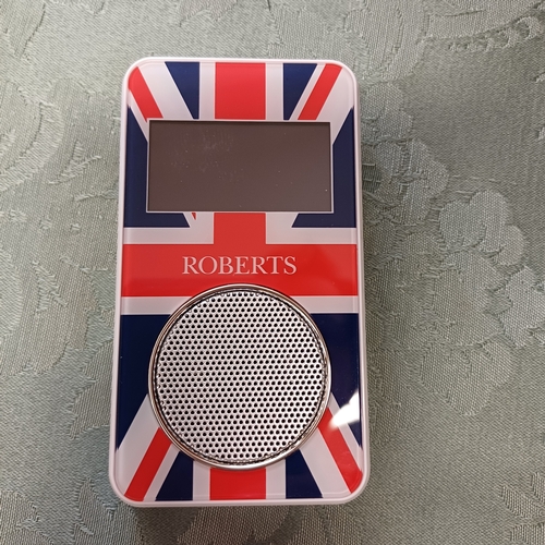 168 - A Roberts Personal Radio with Ear Phones and Charging Unit.  This is in a Union Flag design as it wa... 