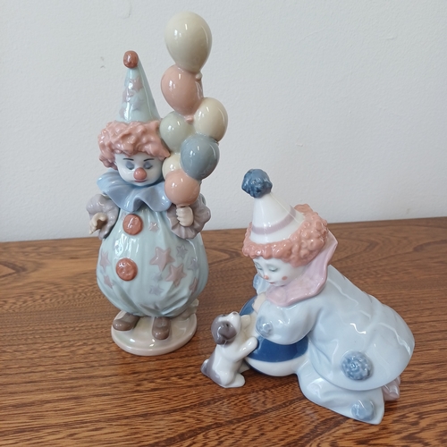 197 - Lladro A Pair of Figures:
1.  Clown and Dog
2.  Clown with Balloons