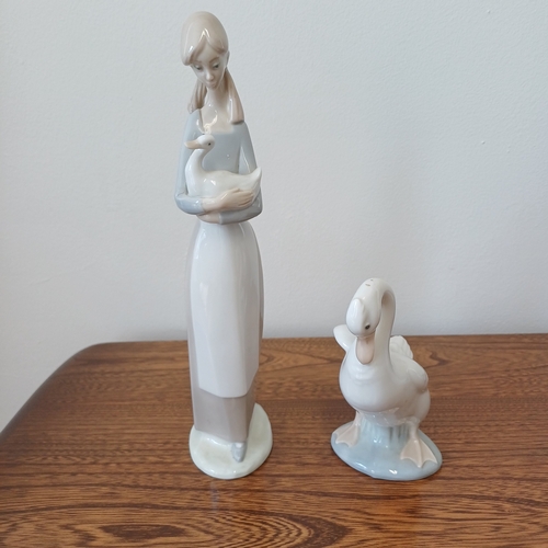 199 - Here we have Two Nao Figures:
1.  Girl with a Swan in her Arms
2.  A Swan