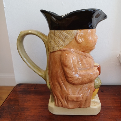 204 - A Pair of Toby Jugs 18cm and 16cm