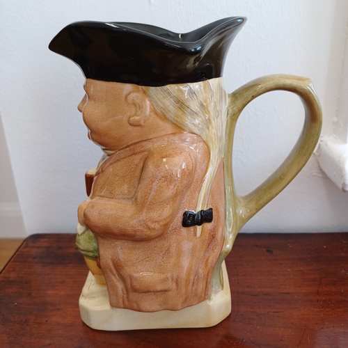 204 - A Pair of Toby Jugs 18cm and 16cm