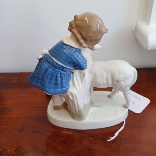 209 - This is a Figure of a Girl with a Sheep.  The Markings are crossed swords 1859 (German)