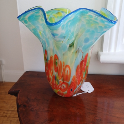 217 - A Beautiful Handkerchief Vase with the usual vivid colours.  We were advised by the Vendor that is w... 