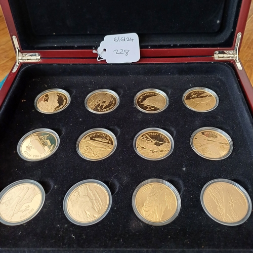 228 - A boxed set of Gold on Silver..  The Set consists of 12 coins to commemorate 