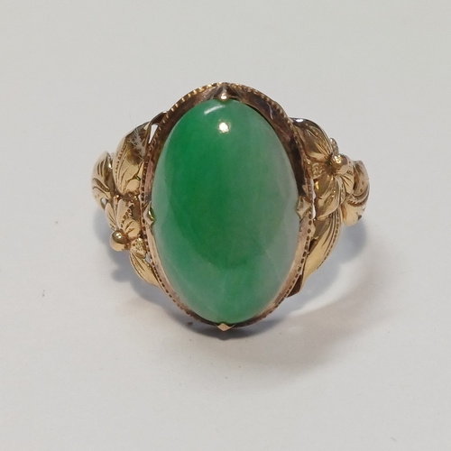 232 - An Antique Chinese Jade Ring with beautiful decorative shank.
- 22ct Gold
- 140 years old