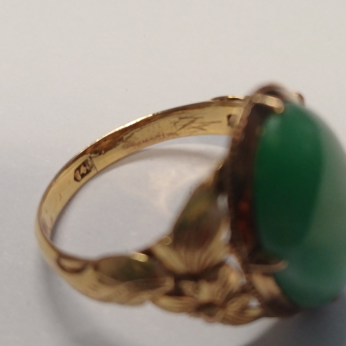 232 - An Antique Chinese Jade Ring with beautiful decorative shank.
- 22ct Gold
- 140 years old