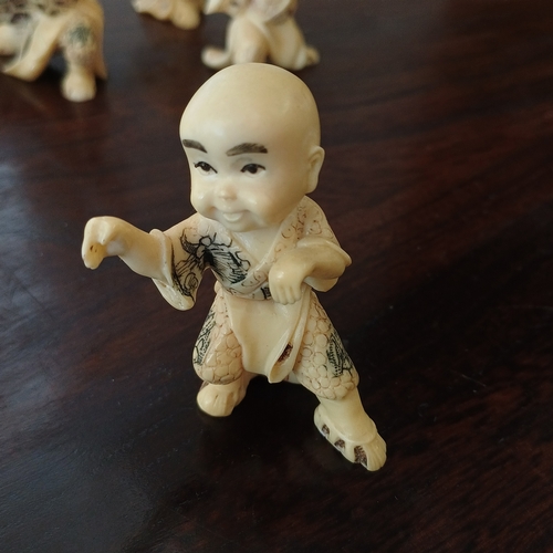 41 - Here we have a set of 8 Japanese Fighting Figures in Carved Resin