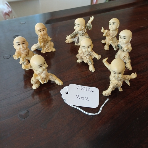 41 - Here we have a set of 8 Japanese Fighting Figures in Carved Resin