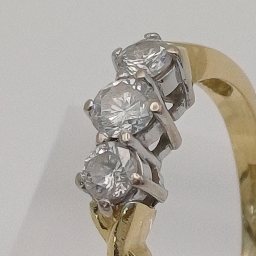 4 - A lovely Three Stone Diamond Ring
- Diamond 0.50 ct
- weight 3.30g
- size P
- 18ct yellow gold