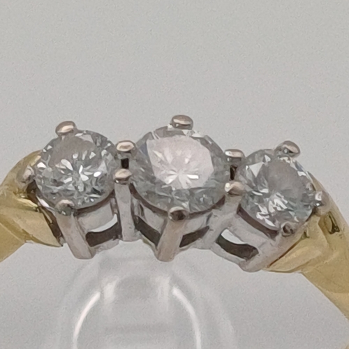 4 - A lovely Three Stone Diamond Ring
- Diamond 0.50 ct
- weight 3.30g
- size P
- 18ct yellow gold