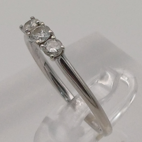 7 - A Three Stone Diamond Ring
- diamond 0.25 ct
-weight 1.52g
- size M
- 9ct white gold