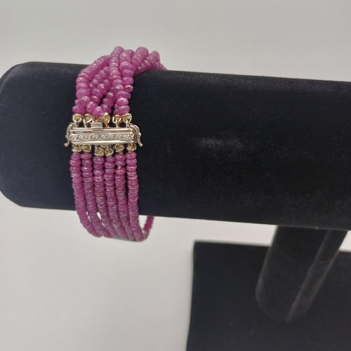 14 - An eye catching unpolished Ruby Bracelet with Diamonds set in to bands.
- weight 38.12 g
- 14ct clas... 