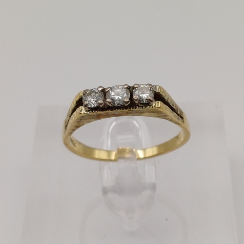 20 - An unusual Three Stone Diamond Ring
- 18ct yellow gold
- 60 points
- weight 3.9g
- size P / Q