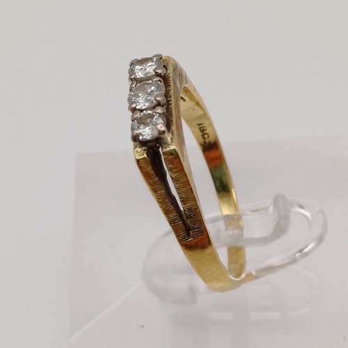 20 - An unusual Three Stone Diamond Ring
- 18ct yellow gold
- 60 points
- weight 3.9g
- size P / Q