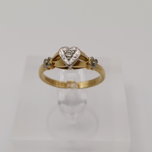 28 - Heart Shaped Ring with a Diamond set in with flow detail in the shoulders of the shank.  A really pr... 