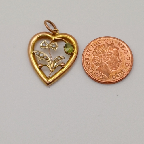 30 - A Victorian Heart Shaped Pendant with Peridot Stone with Sea Pearls.  A really pretty piece.
- 9ct y... 