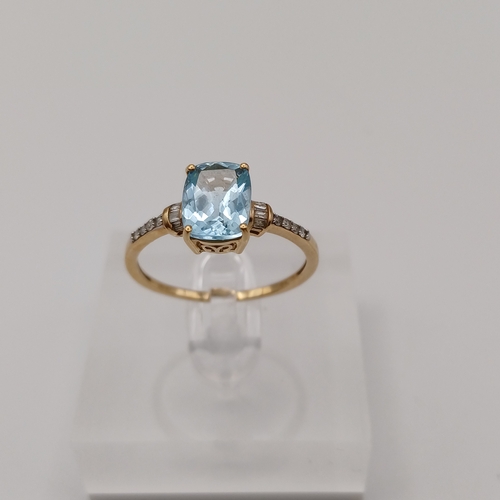 39 - Pretty Ladies Blue Topaz and Diamond Ring
- size T
- 9ct yellow gold