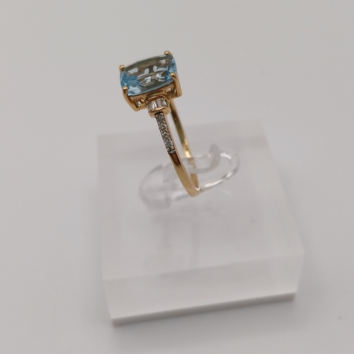 39 - Pretty Ladies Blue Topaz and Diamond Ring
- size T
- 9ct yellow gold