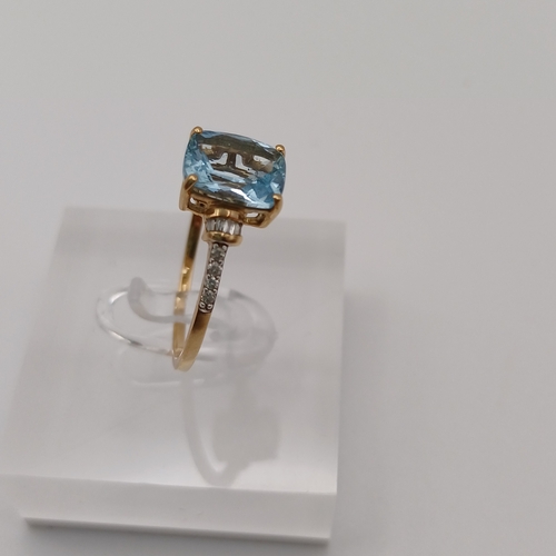 39 - Pretty Ladies Blue Topaz and Diamond Ring
- size T
- 9ct yellow gold