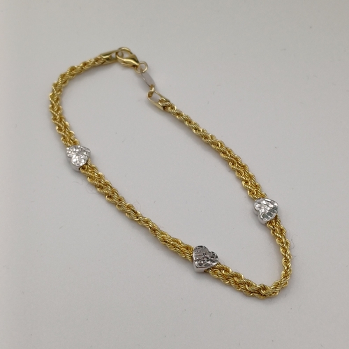 41 - A pretty Rope Bracelet with Heart Detail
- 925 and 9ct Bonded Gold
- weight 3.55g
- length 7.5 inche... 