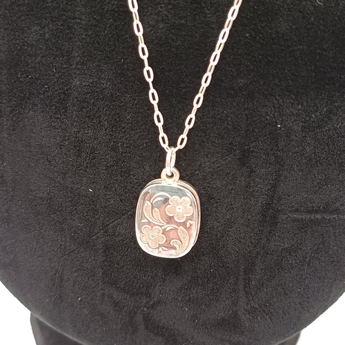 42 - Pretty Silver Sliding Locket.
- 925 silver both locket and chain