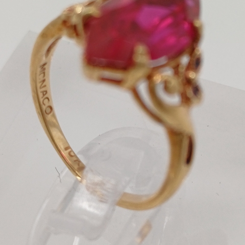 44 - A pretty Ruby Ring.  The Ruby is set into a detailed decorative shank.
- 10ct yellow gold
- Size E /... 